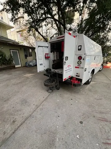 Magnet Plumbing service vehicle on-site for Grease Trap Cleaning in Sanibel